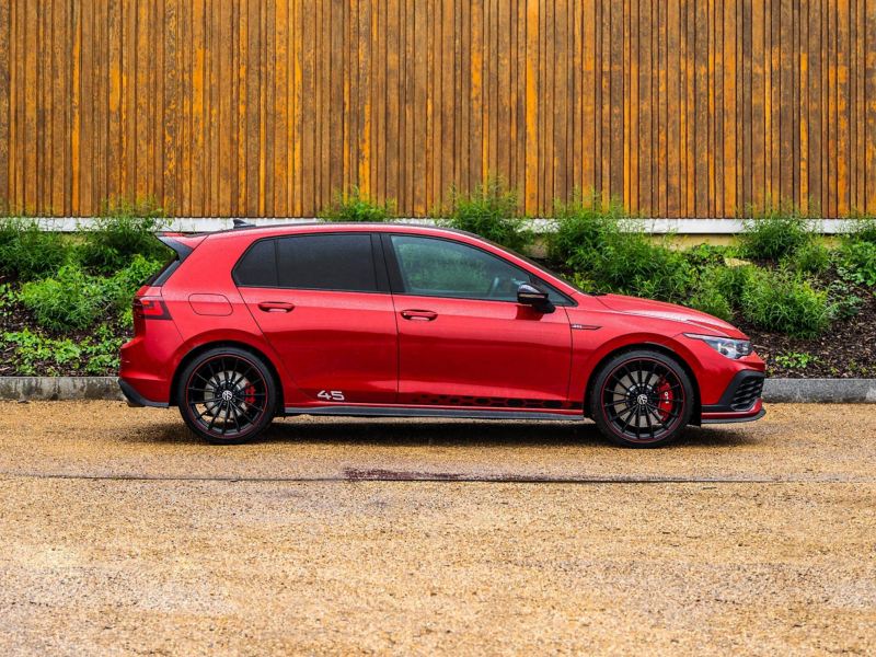 A side profile shot of a red Mk 8 VW Golf Clubsport 45