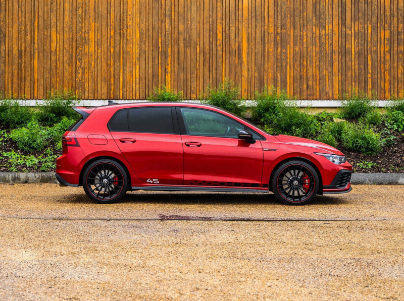 A side profile shot of a red Mk 8 VW Golf Clubsport 45