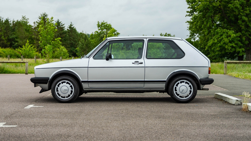 A side profile shot of a silver VW Mk 1 Golf GTI