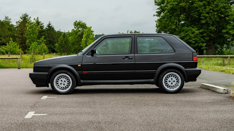 A side profile shot of a black Mk 2 VW Golf GTI