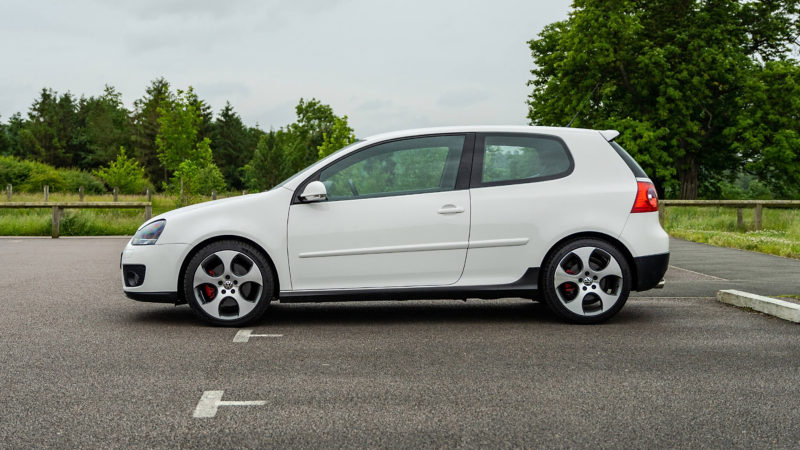 A side profile shot of a white Mk 5 VW Golf GTI