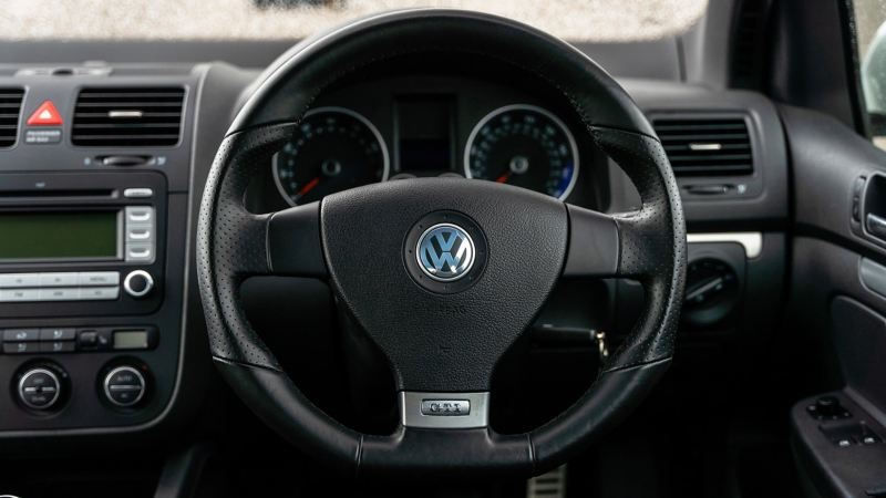 A close up of the steering wheel in a Mk 5 VW Golf GTI