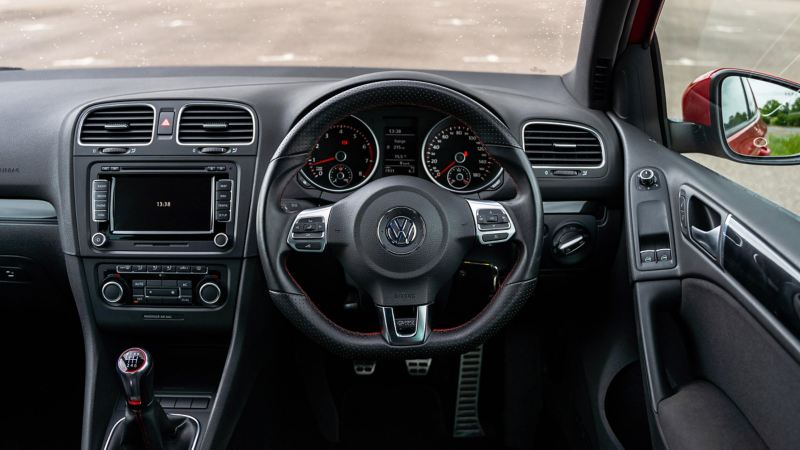 An interior shot of the front cabin of a Mk 6 VW Golf GTI