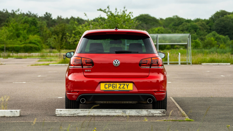 A rear shot of a red Mk 6 VW Golf GTI 