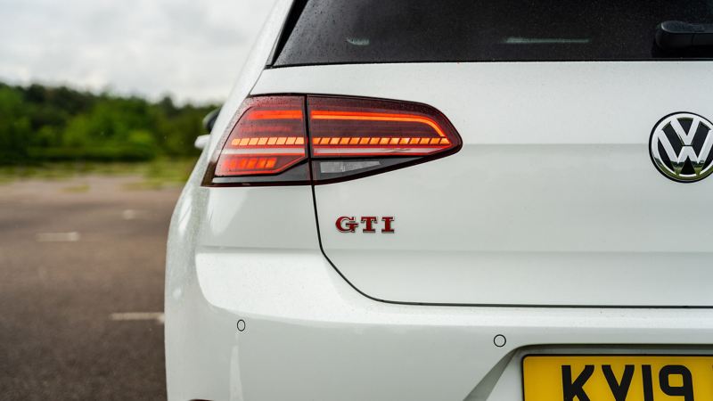 A close up of the rear GTI badge on a white Mk 7 VW Golf GTI