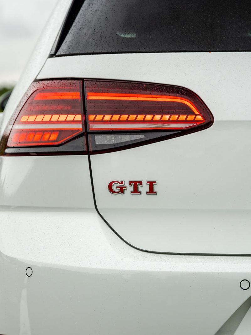 A close up of the rear GTI badge on a white Mk 7 VW Golf GTI