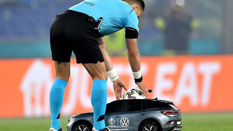 UEFA referee places football in tiny VW ID.4 before kick off