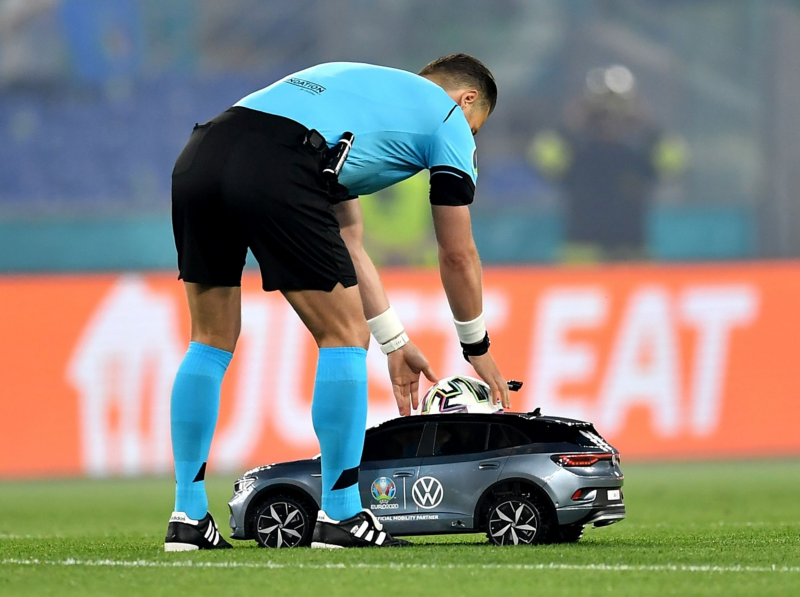 UEFA referee places football in tiny VW ID.4 before kick off