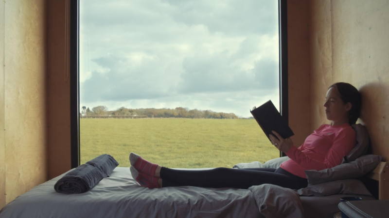 Tracy Thornton sat in a bedroom overlooking a countryside window view. 