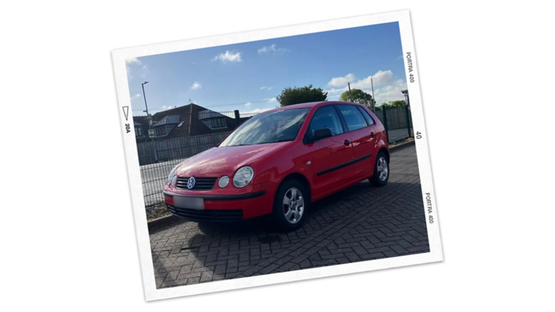 A red Polo parked in the street