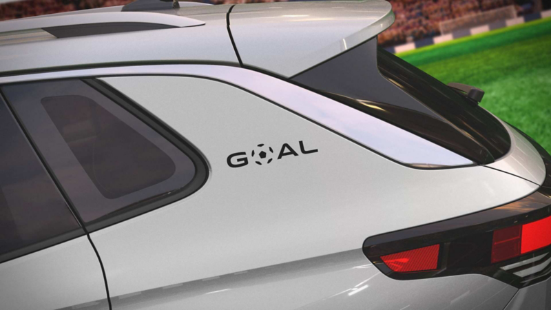 Emblema GOAL en el exterior de un Tiguan mexicano de color blanco.
