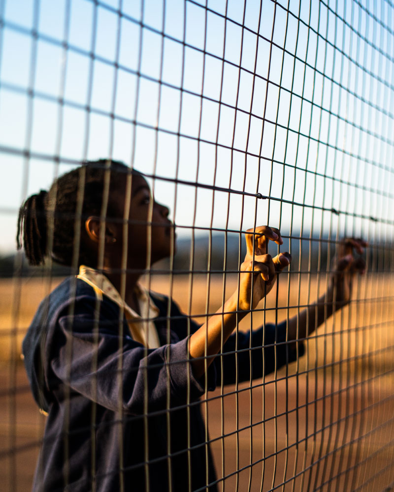 Madisa by the fence
