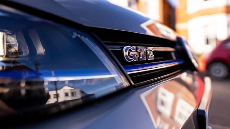 A closeup shot of the GTE badge on the front of the Golf
