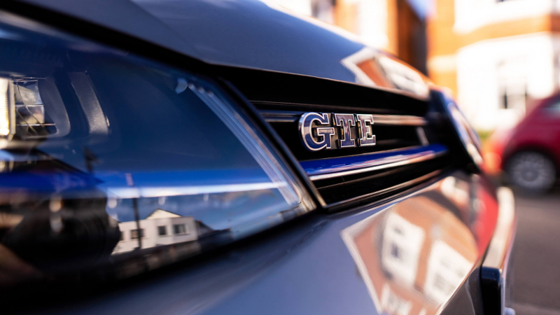 A closeup shot of the GTE badge on the front of the Golf