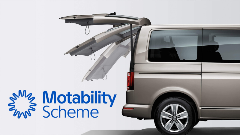 Volkswagen van with accessible rear door, with Motability logo