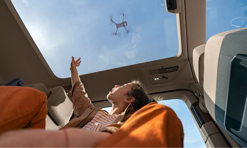 View through the panoramic sunroof of the VW Multivan.