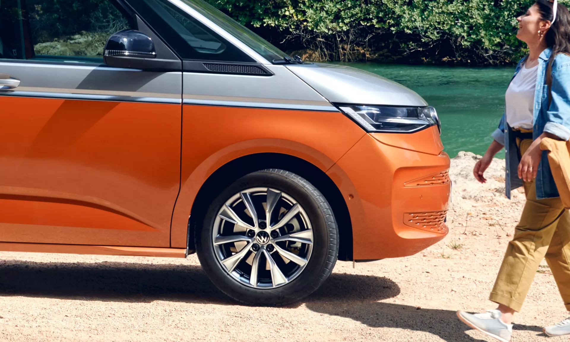 Volkswagen Caravelle orange body with alloy wheels