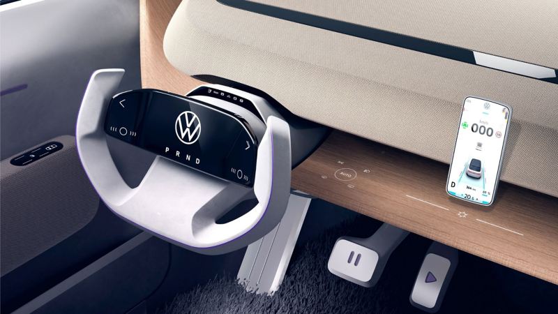 CGI shot of ID. Life steering wheel and interior dashboard with a smartphone resting on it