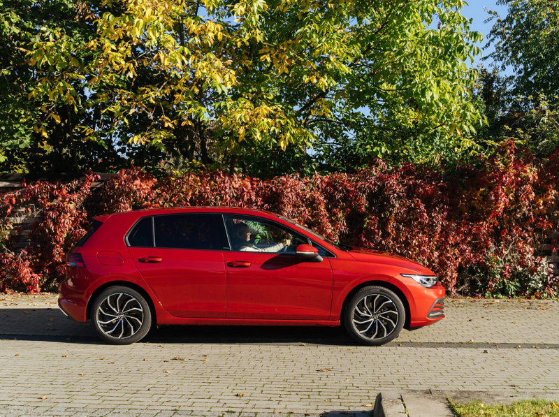 a red Golf parked outside