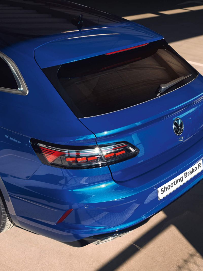 A blue VW R Arteon R Shooting Brake is parked in a multi-storey car park