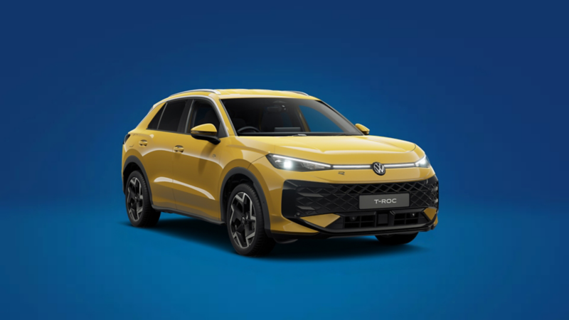 A front 3/4 shot of a yellow Volkswagen T-Roc R-Line on a blue background