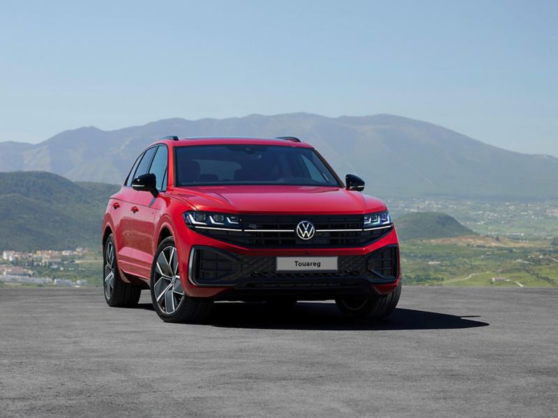 a red touareg on a mountain path