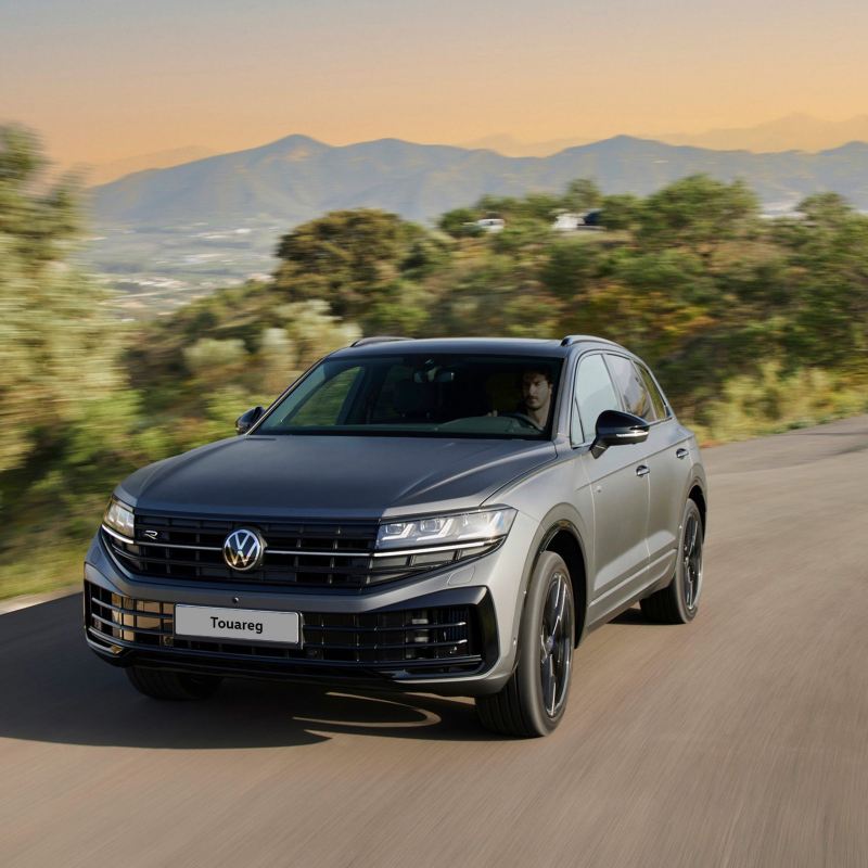 A Volkswagen Touareg driving in the countryside