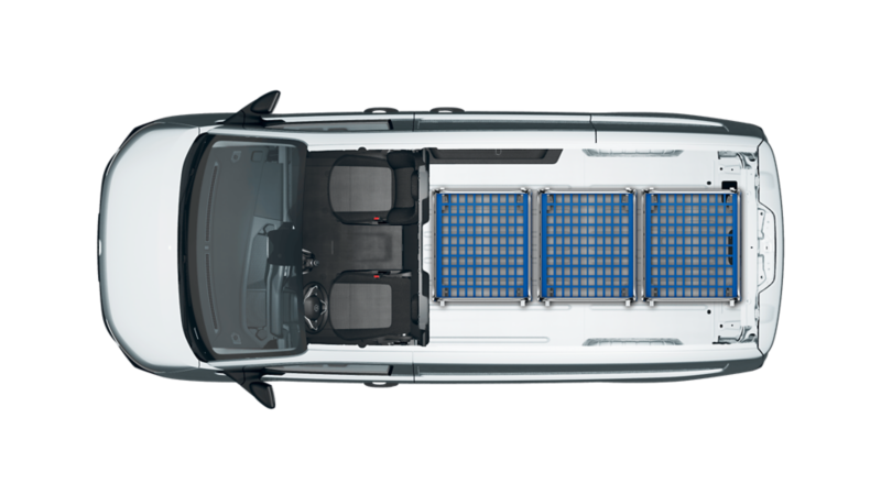 2-sits VW Transporter med rullcontainrar i lastutrymmet.