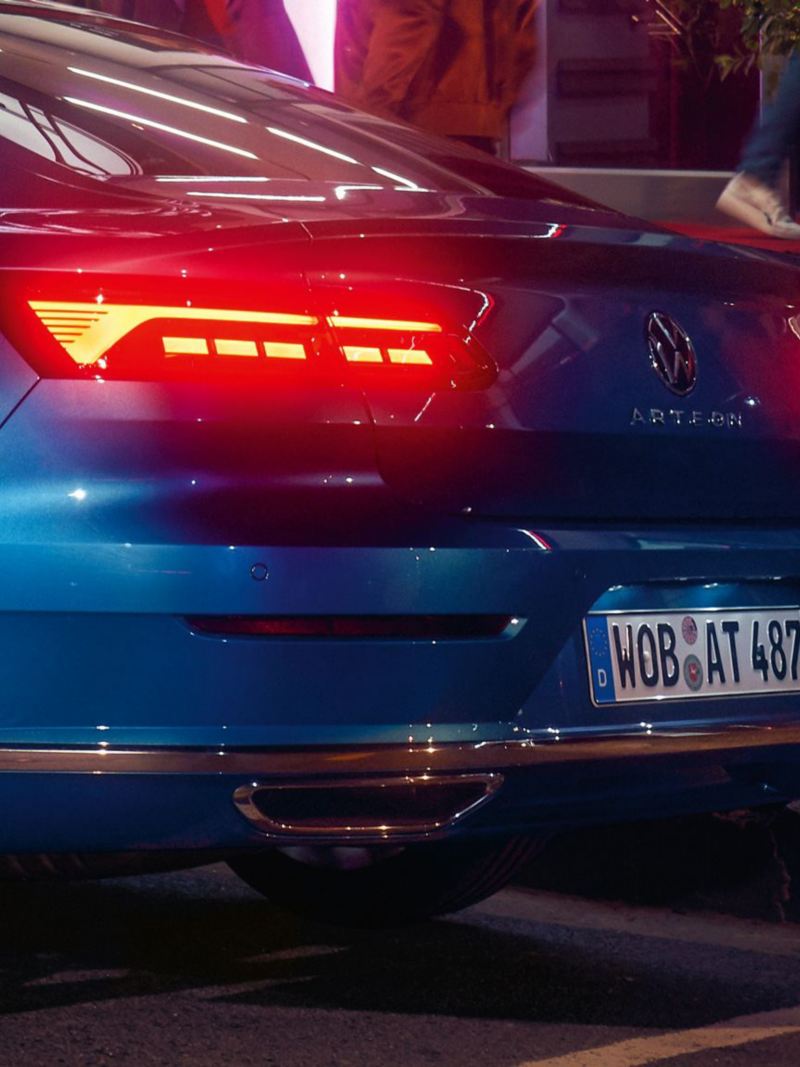 An image showing the tail lights of a New Arteon with the break lights on.