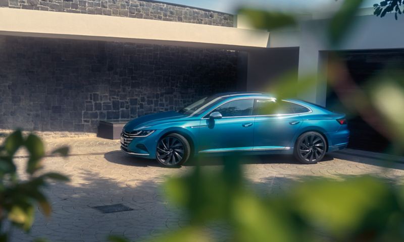 The Arteon parked on a driveway