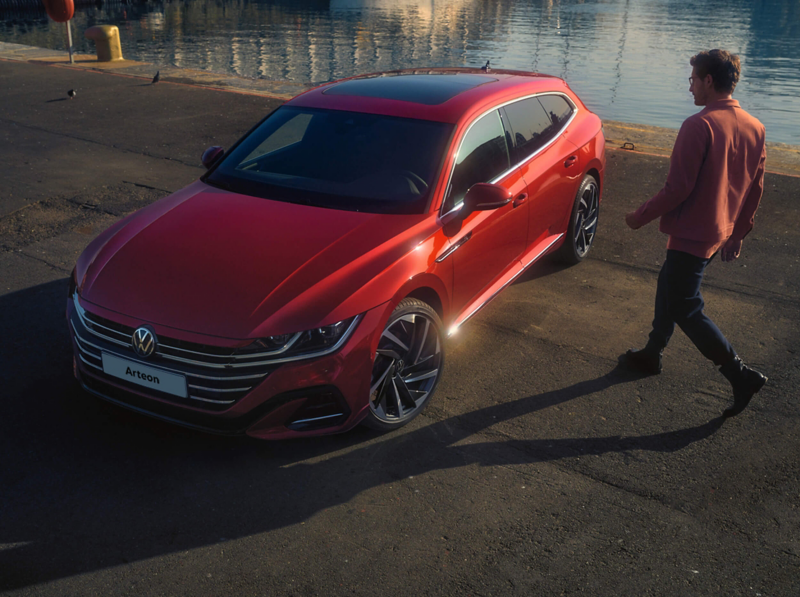 A man approaching his Arteon Shooting Brake