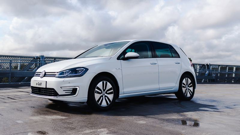 3/4 view of a parked white VW e-Golf