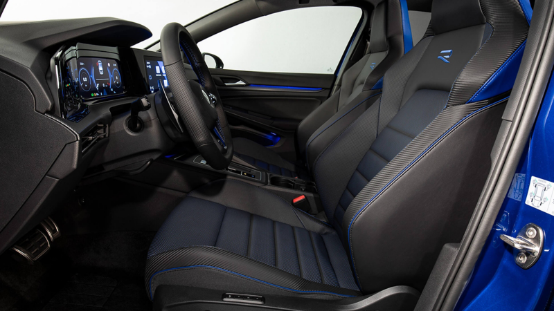 Golf R from inside with sports seats. View through the driver's door.