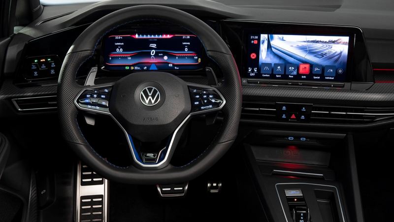 VW Golf R interior cockpit with focus on the steering wheel and Infotainment system