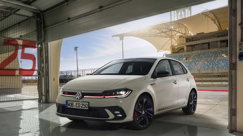 Photo of a Polo GTI Edition 25 parked at a race track. 