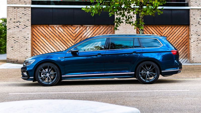 Side view of a blue Volkswagen Passat Estate parked on the street