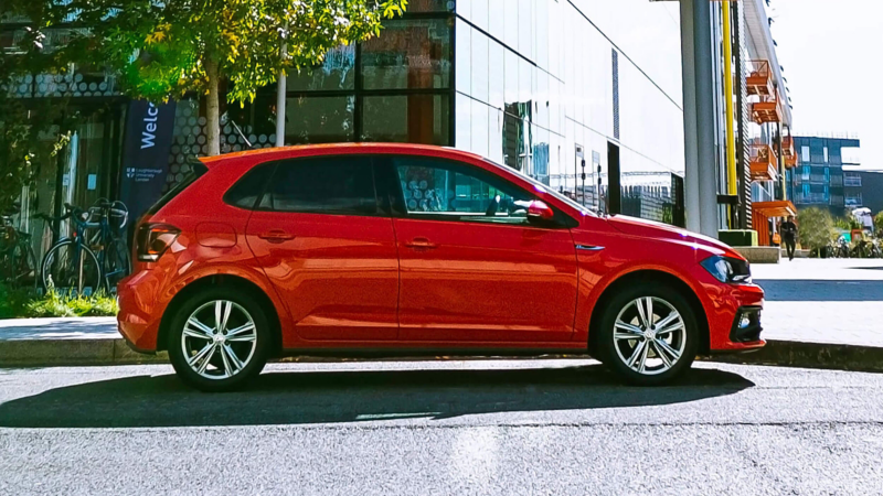 Side view of a red VW Polo