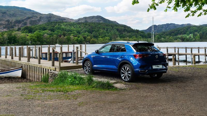 T-Roc parked in front of a large lake