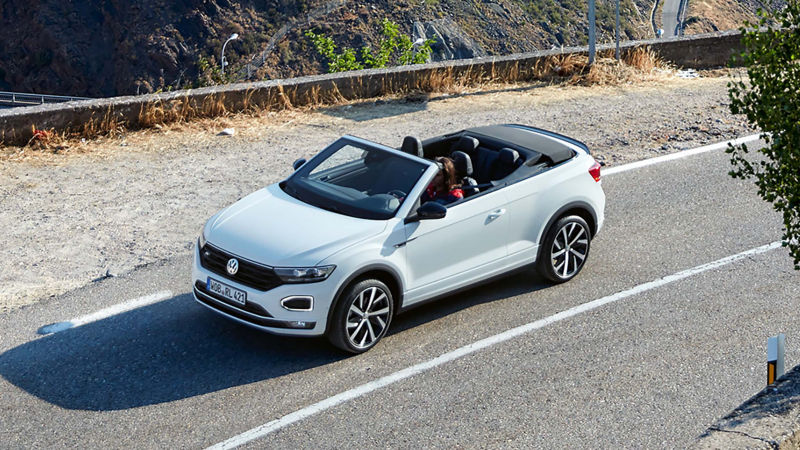 A man walking towards the T-Roc Cabriolet