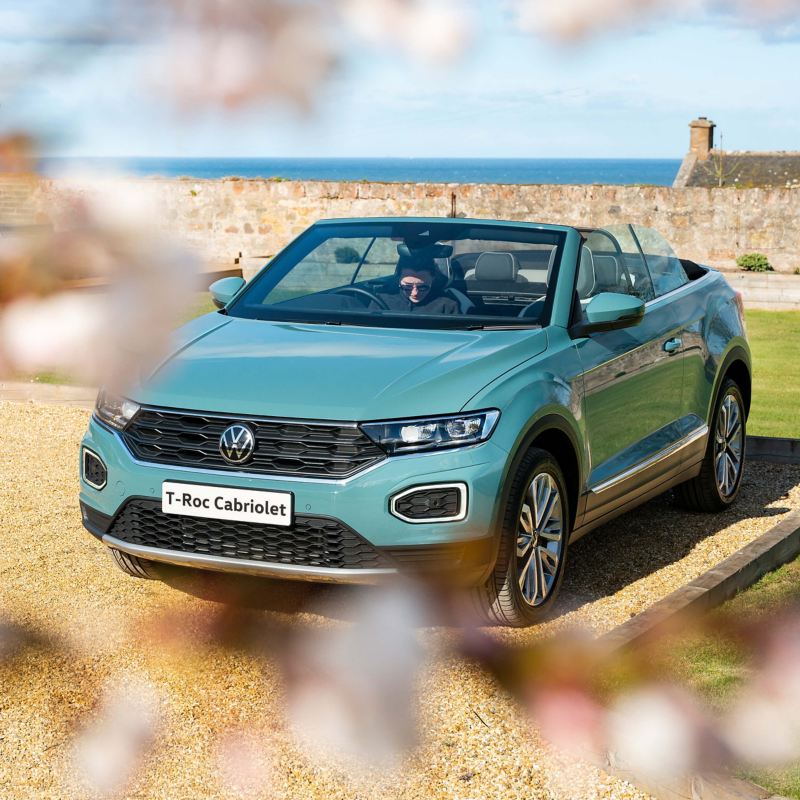 A blue T-Roc Cabriolet from 3/4 front angle