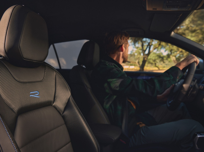 Interior shot of VW T-Roc R with driver at wheel