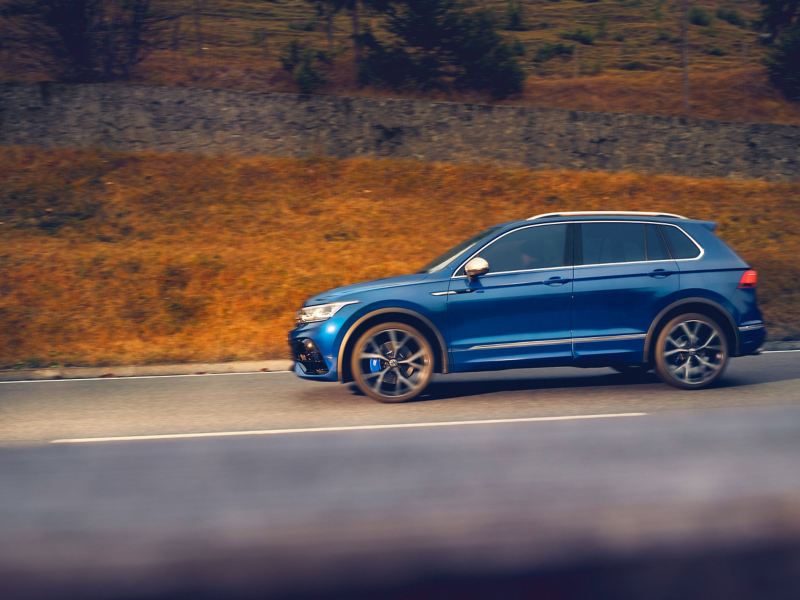 The Tiguan R from Volkswagen R drives along a road