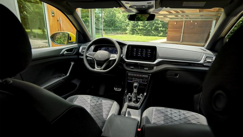 Interior shot of front cockpit and seats in a T-Cross car