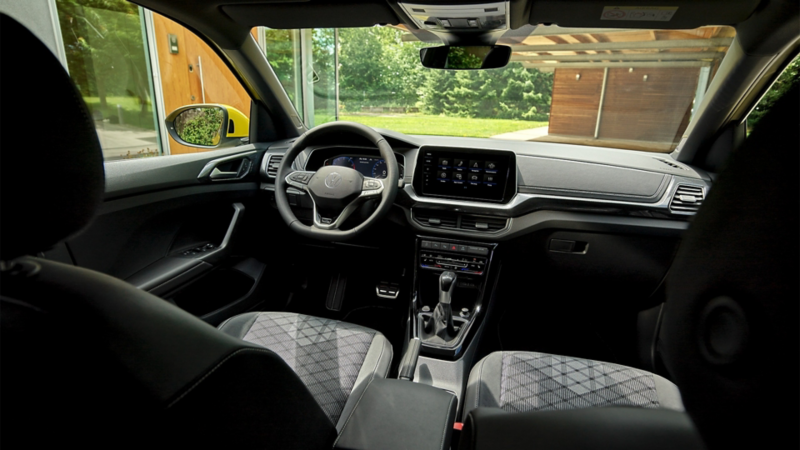 Interior shot of front cockpit and seats in a T-Cross car