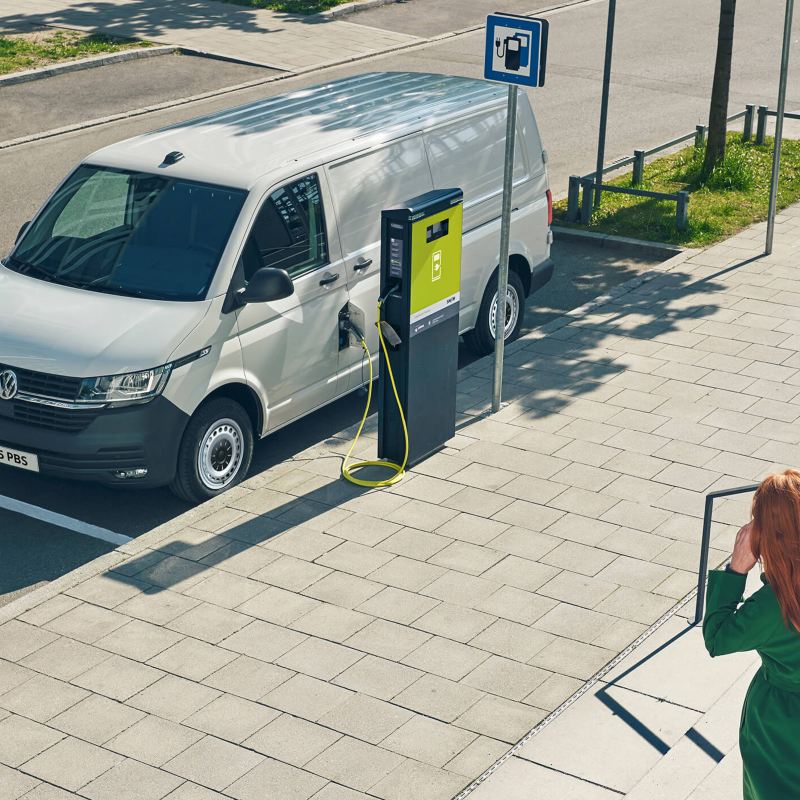 VW ABT e-Transporter plugged into charging point
