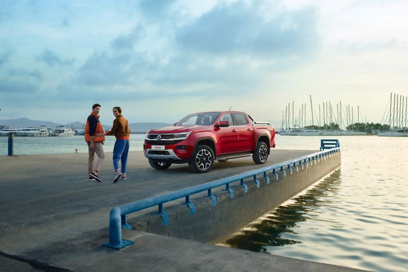 Red Amarok parked in the marina area