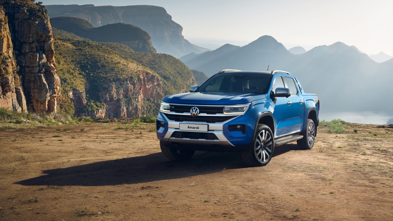 Amarok parked against a mountainous background. 