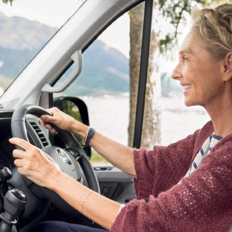 Women driving a Grand California van