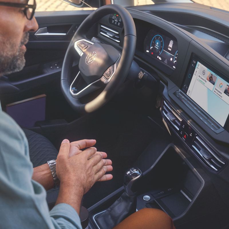 person sitting inside the new caddy