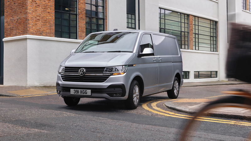 Transporter panel van driving on the road 